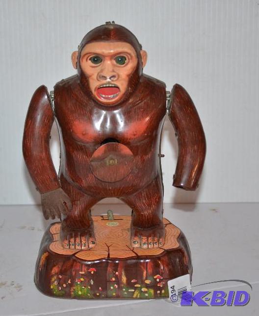 lot 194 image: Modern Toys battery operated mechanical monke...