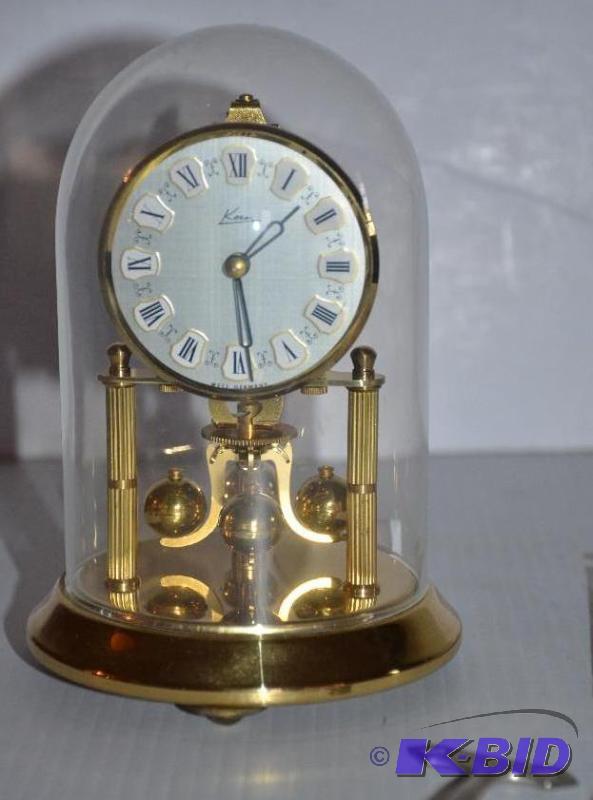 lot 49 image: Vintage Kern Anniversary clock with glass dom...