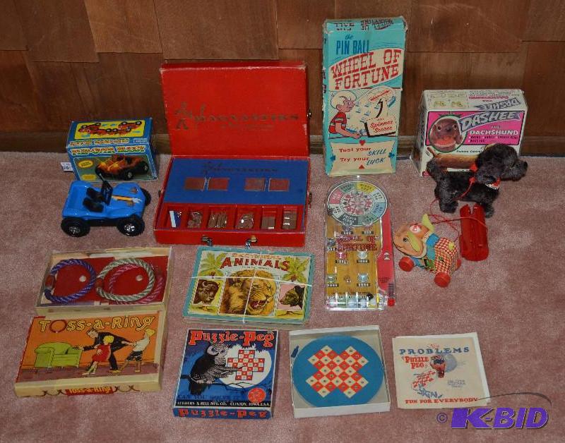 lot 63 image: 8 vintage toys - Flip Over Buggy, Puzzle Peg,...