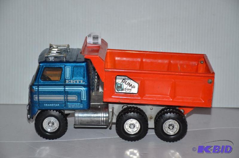 lot 73 image: Ertl Dump truck 13" long...