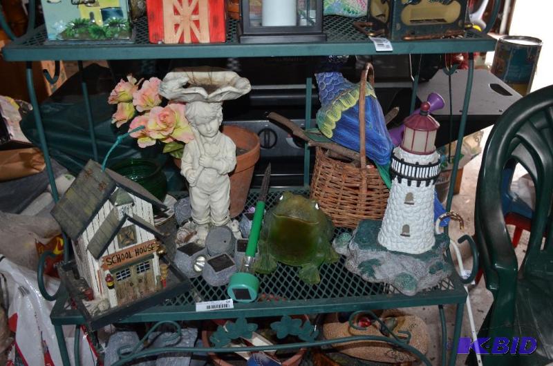 lot 94 image: Contnets of shelf - lawn decor...