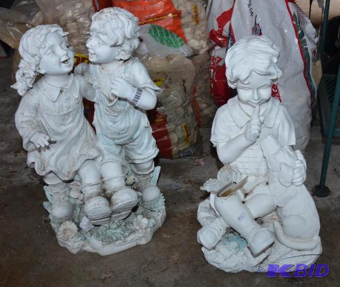 lot 95 image: Two yard statues 19" tall....