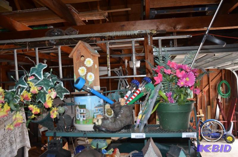 lot 97 image: Contents of shelf - flowers, pots, tins, bird...