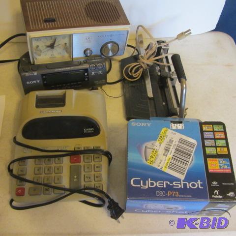 Calculator, Radio Alarm, Paper Punch