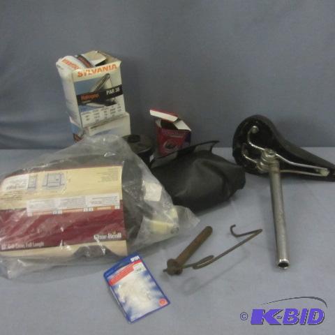 lot 31 image: Grill Cover, Bike Seat, Pin