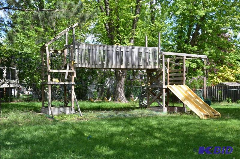 lot 4 image: Playset 24 3" up until the love swing ...