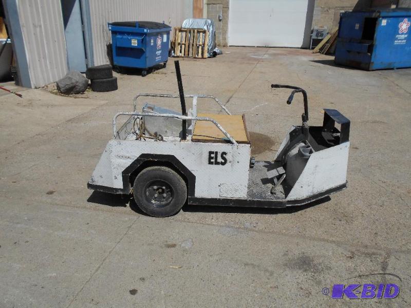 lot 12 image: Cushman Utility  Shop Cart. Includes Charger.