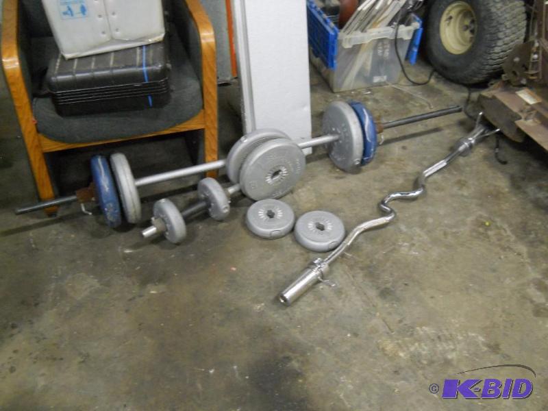 Just the curling weightlifting bar on the left in the photo.