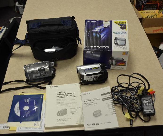 lot 126 image: 2 camcorders. Sony DCR-DVD610, Canon ZR65 MC....