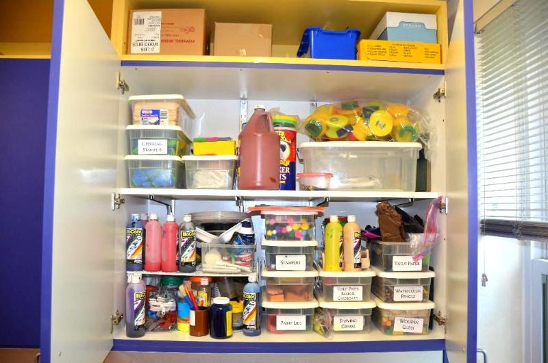 lot 193 image: Contents of shelves - paint, tongue depressor...