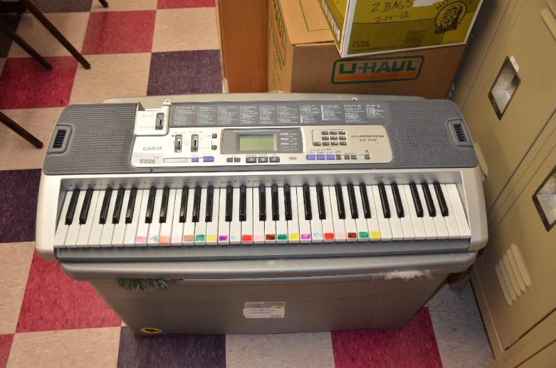 lot 213 image: Casio LK100 37" keyboard. No power cord...