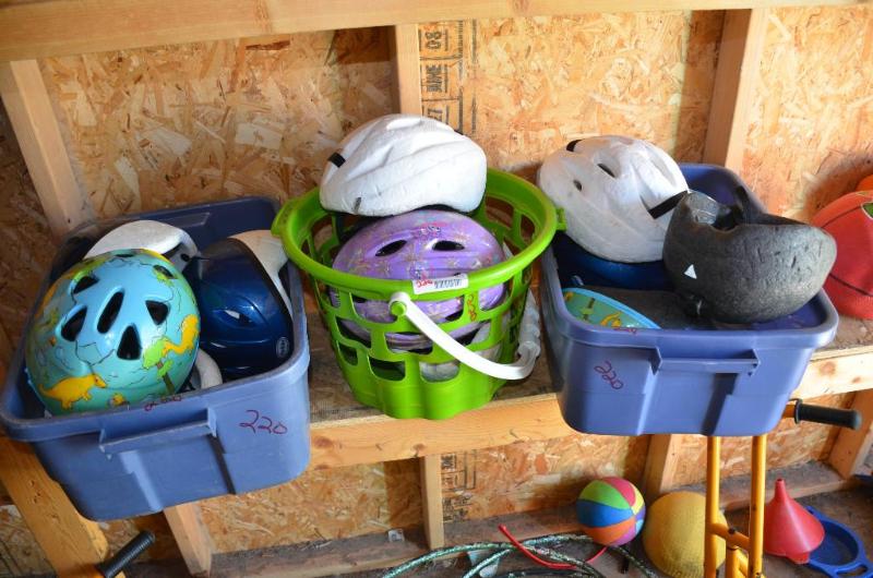 lot 220 image: Bike helmets, approx 12. Tubs are included....