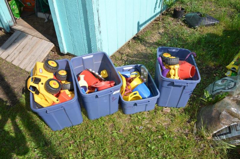 lot 222 image: Little Tikes trucks, jump ropes, sand toys. T...