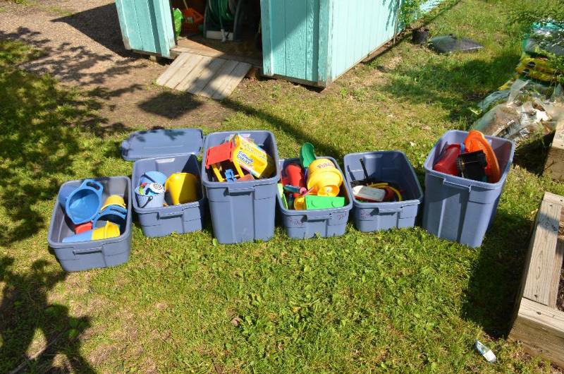 lot 224 image: Trucks & sand toys. Six tubs of toys. Tub...