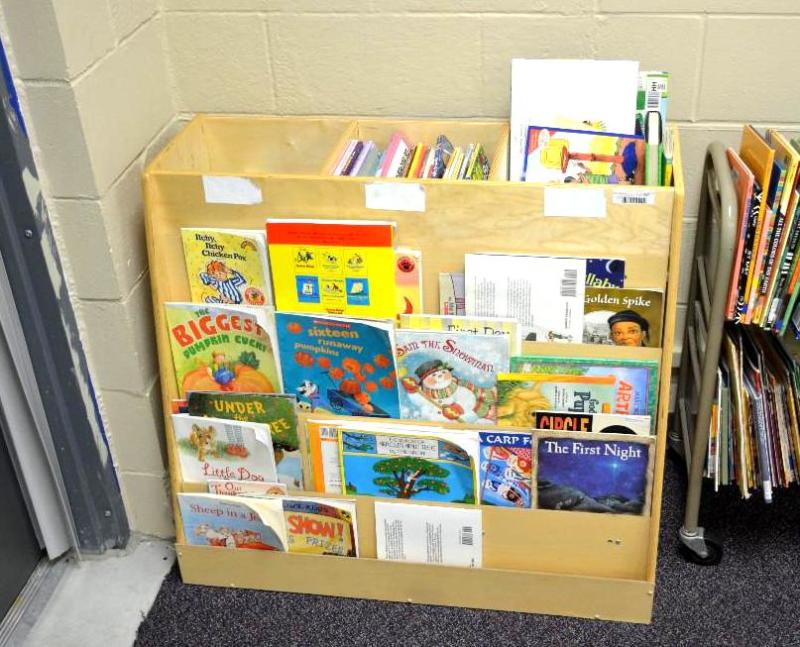 lot 66 image: Wood shelf with books 36x33x12". Childre...