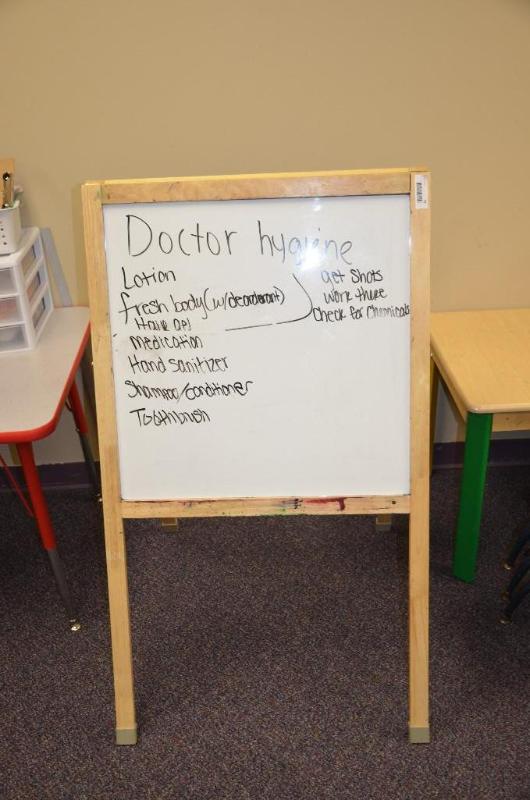 lot 72 image: Dry erase board easel 28x49"...