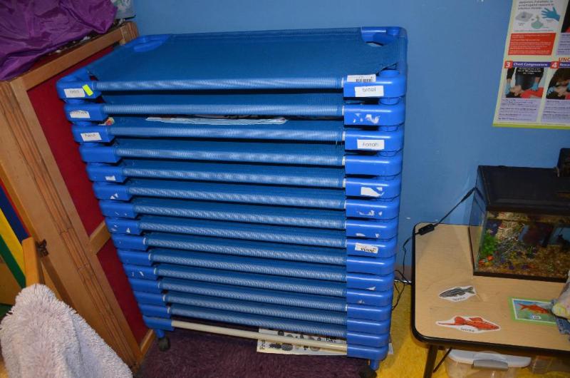 lot 92 image: 8 childrens cots 38x21" with rolling ca...