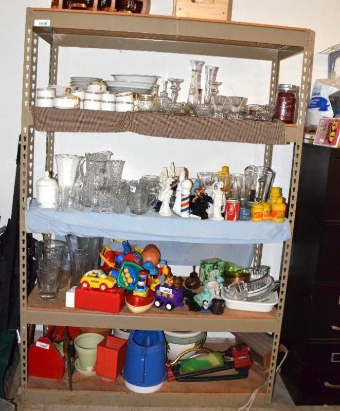 lot 129 image: Shelving Unit 49x72x19. Contents not included...