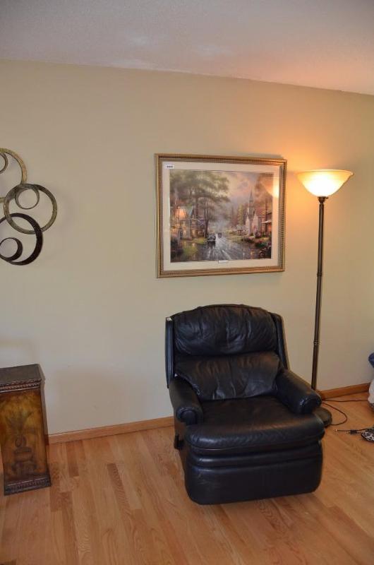 lot 2 image: Leather recliner. 36x32x33. Kind of match...