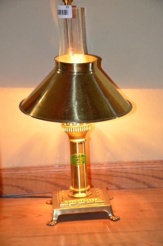 lot 23 image: Brass lamp sticker says- Paris, Orient Expres...