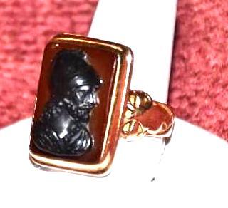 lot 2L image: Gold figure ring...
