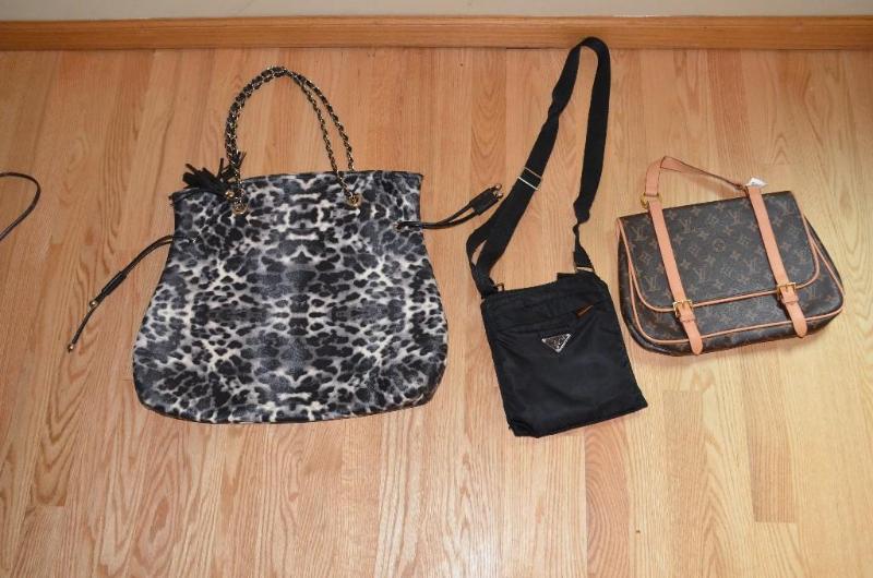 lot 33 image: Louis Vouitton purse Prada ipad mini bag an...