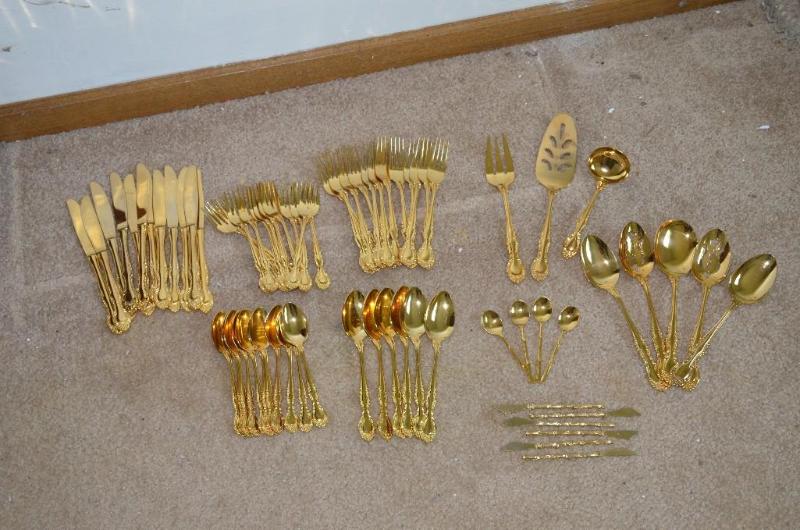 lot 59 image: Lot of gold colored utensils and serving ware...