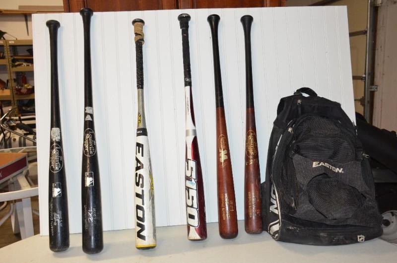 lot 62 image: Easton baseball backpack with 6 baseball bats...