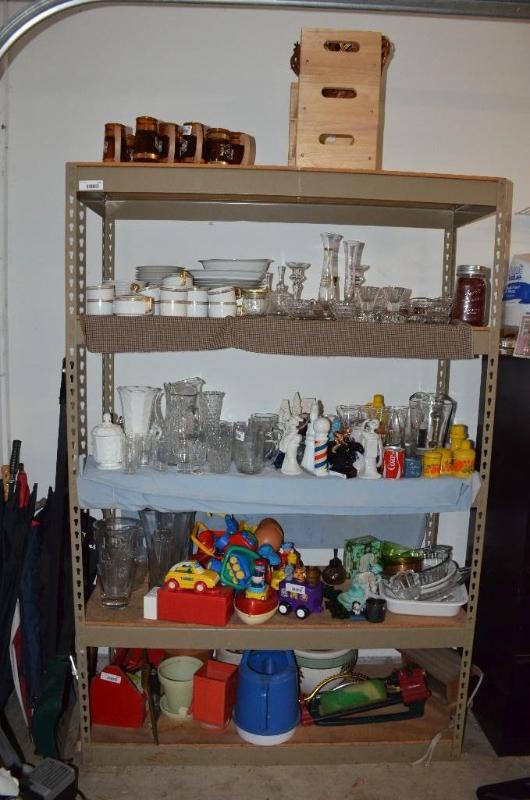 lot 71 image: Shelving Unit 49x72x19. Contents not included...