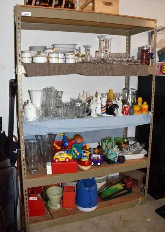 lot 72 image: Shelving Unit 49x72x19. Contents not included...