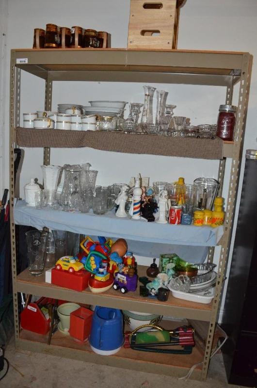lot 73 image: Shelving Unit 49x72x19. Contents not included...