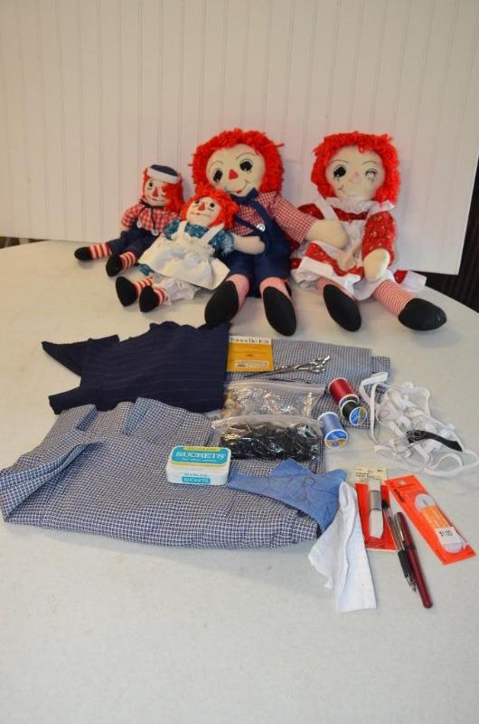 lot 96 image: Lot of four Raggedy Anne Dolls of various siz...