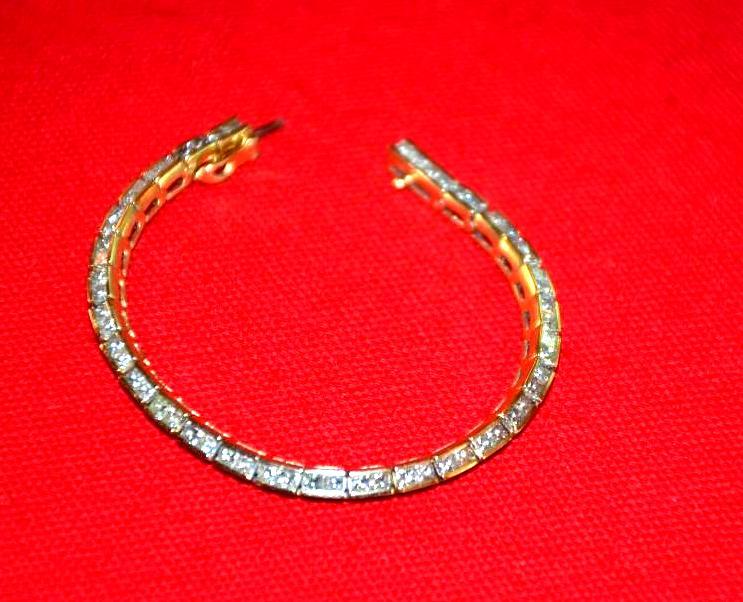 lot 150 image: 14k gold and diamond tennis braced- 58 beauti...
