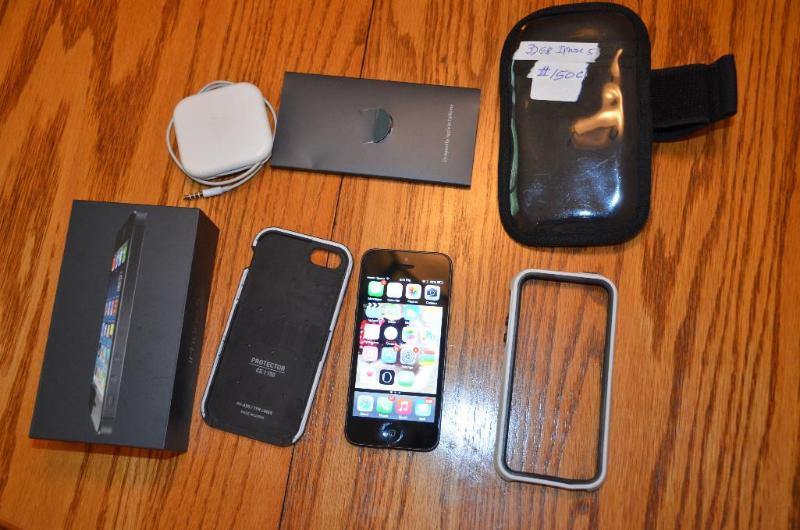 lot 150C image: 32gb iPhone 5 with pelican case and running a...