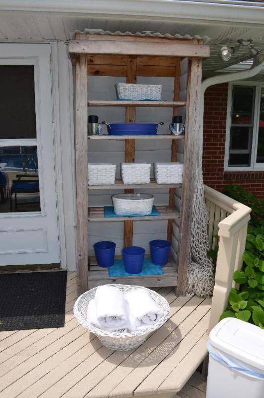 Out door shelving unit and contents. 82x16x24...