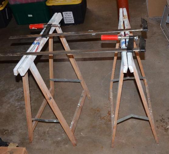 Two saw horses and two wood clamps...
