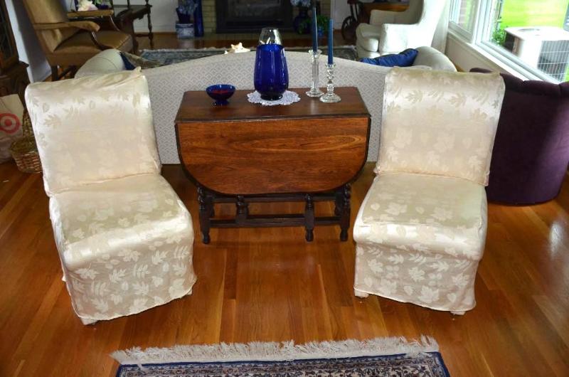 Four matching chairs on casters. Table not in...