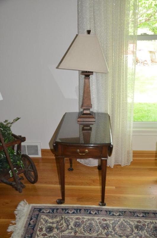 Pembrook drop leaf table on casters. the lamp...
