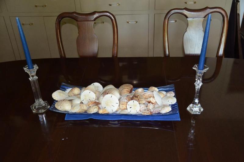 Glass bowl with sea shells &ampsand dollars,...