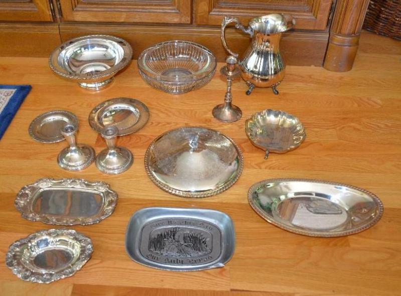 Sterling silver candle holders, ornate plates...