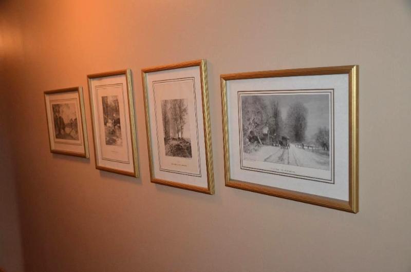 4 framed prints are the four seasons in Germa...