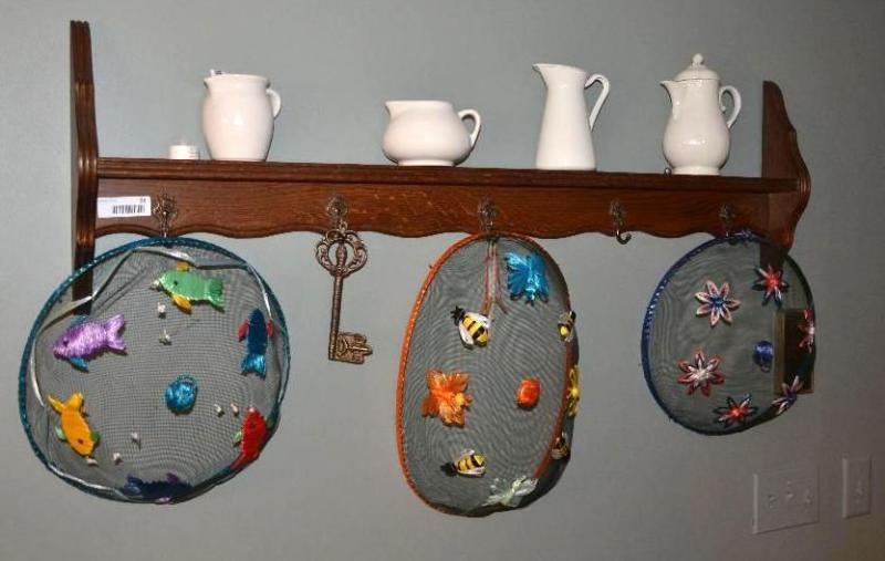 Wooden wall shelf with hooks. 48&quot long...
