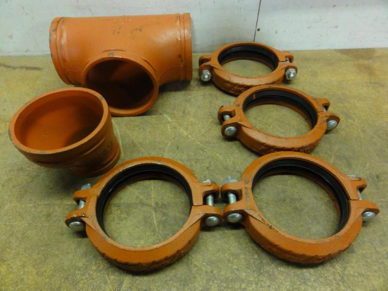 lot 108 image: Assorted 6 Victaulic Pipe Fittings to include (1) No. 20 Tee, (1) No. 51 6 to 4 Reducer, (4) Zer