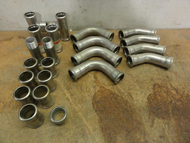 lot 111 image: Assorted Victaulic 1 IPS Stainless Steel Pipe Fittings to include, (4) No. S591 Elbows, (2) No. S590