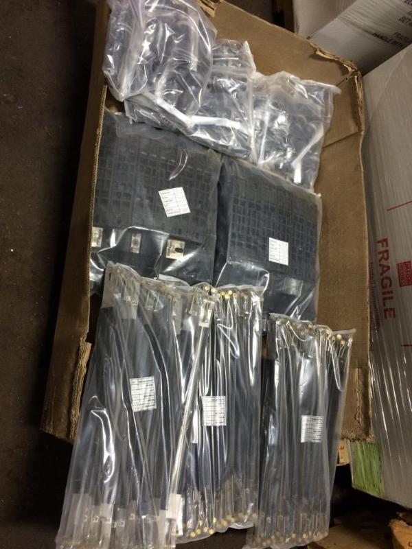 lot 88 image: Assorted new parts. (72) pipe straps, (72) Codeline 52169, (48) assorted fittings