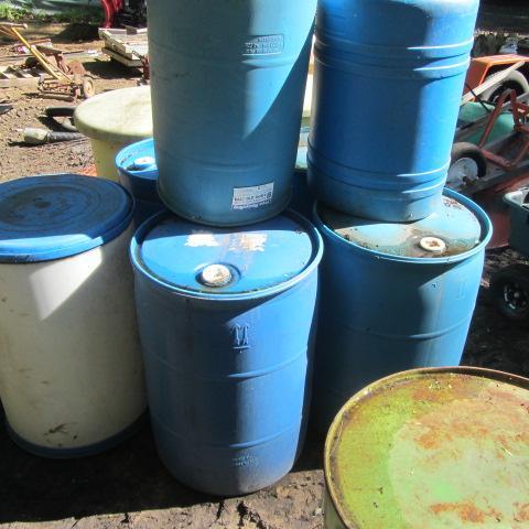 Seven Plastic Drums