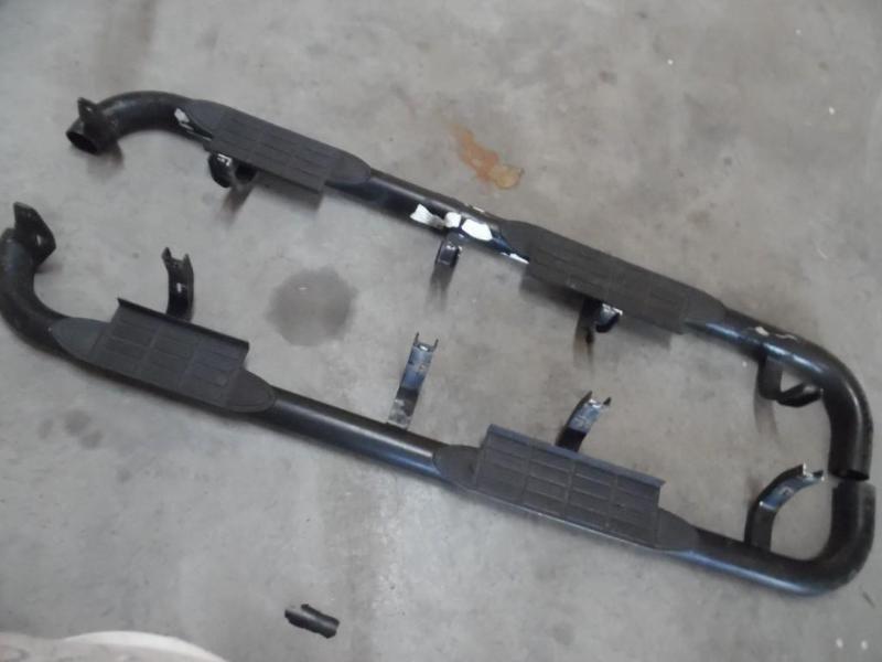 Truck side step bars and racing tire