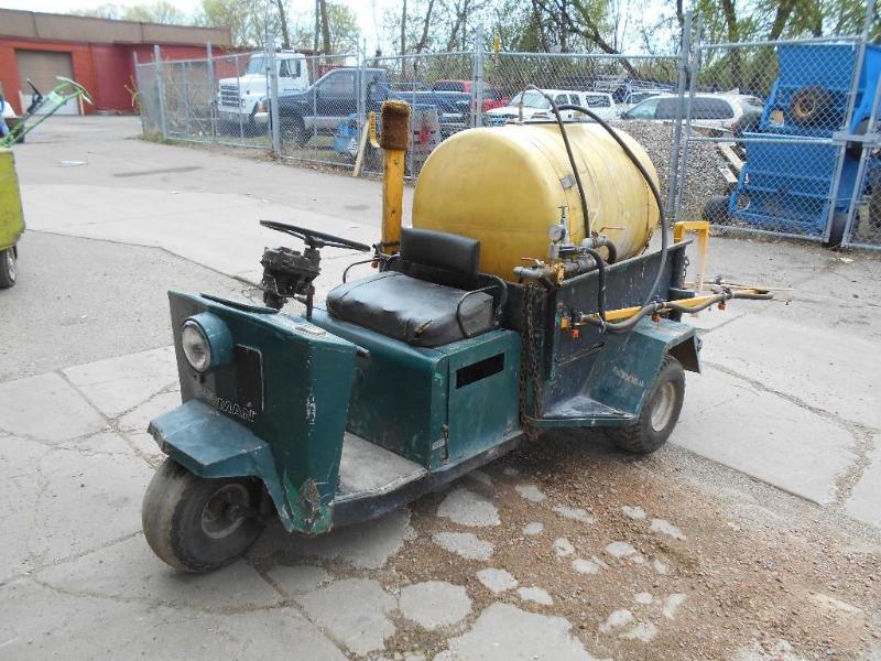 lot 3 image: Cushman Truckster with 100 Gallon Sprayer.