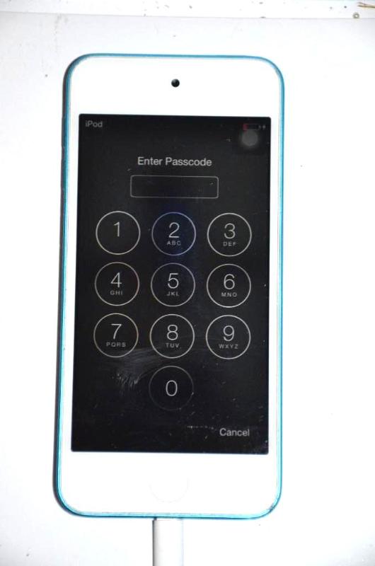 lot 1 image: Apple iPod Touch - powers up, password protec...