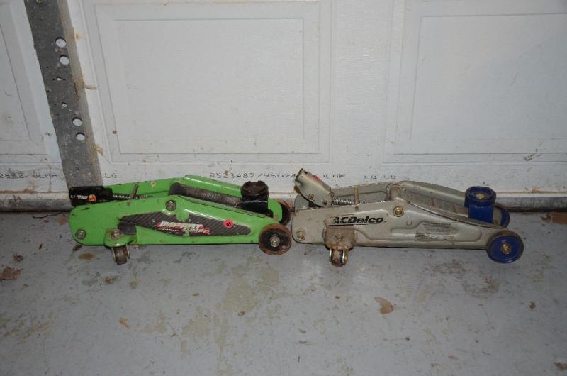 lot 122 image: Two floor jacks - Impact Turner , AC Delco...